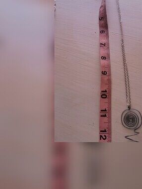 Handmade Spiral Flower Holding Pendant On Chain